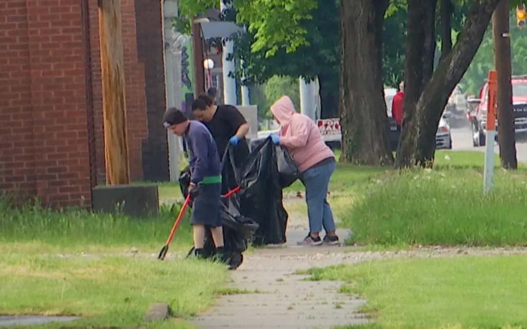 Facing Hunger Foodbank cleans Huntington streets, celebrating Earth Day